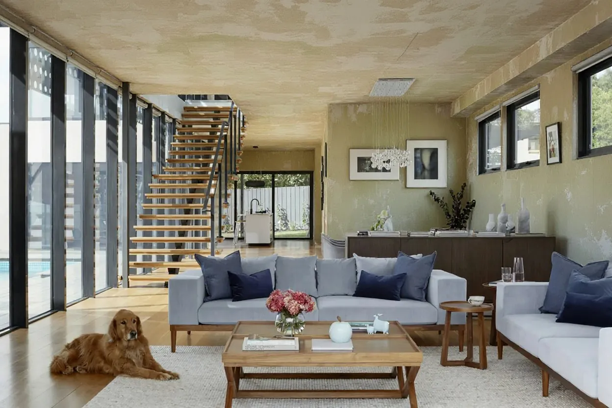 Illustration of the room before: a blotchy stained ceiling and yellowed walls around the same stairs